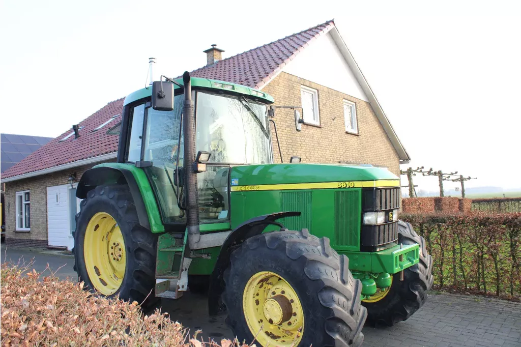 John Deere 6610 PQ geveerde vooras
